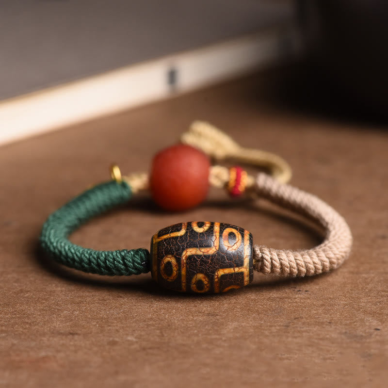 KarmaRipple's Handmade Tibetan Nine-Eye Dzi Bead Wealth Rope Bracelet p1