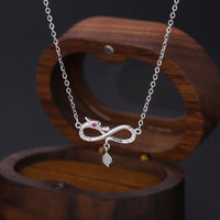 KarmaRipple's 999 Sterling Silver Year Of The Dragon Endless Weave Tail Talisman Protection Pendant Necklace