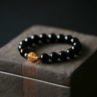 KarmaRipple's Authentic Black Obsidian Ivory Gemstone Black Onyx Dragon Strength Bracelet