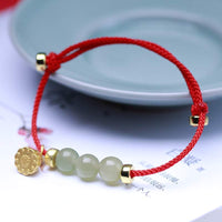 KarmaRipple's Authentic Jade Lotus Seed Strength Red String Weave Bracelet