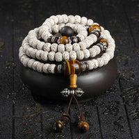 Bracelet de paix tibétain en œil de tigre et graines de Bodhi, fait main par KarmaRipple