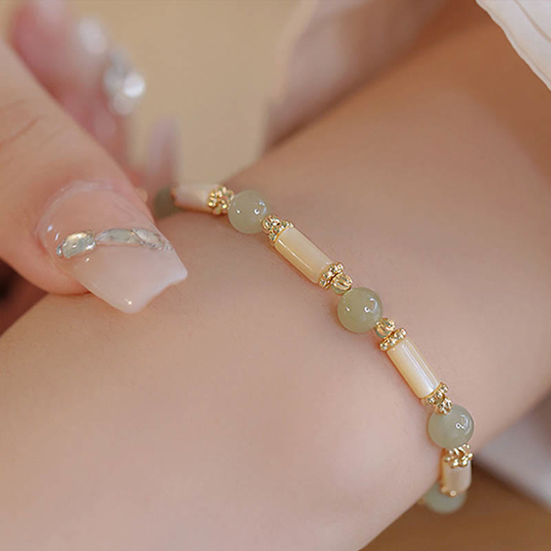 KarmaRipple's Tridacna Stone Red Agate Hetian Jade Blessing Bracelet p3