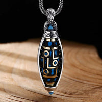 Collier pendentif rotatif tibétain Om Mani Padme Hum à neuf yeux Dzi, motif paix et pureté, de KarmaRipple