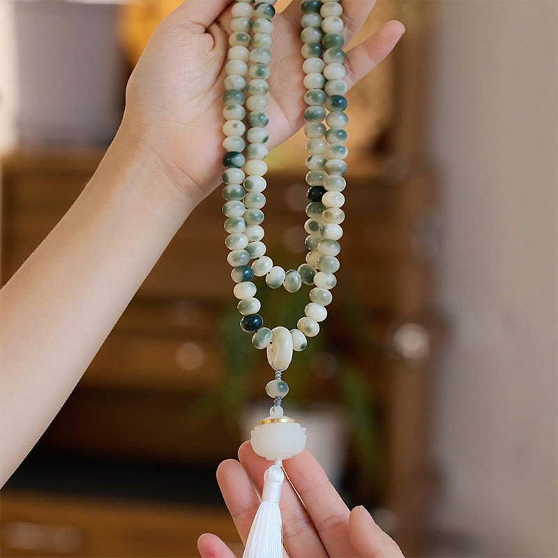 KarmaRipple's Authentic 108 Mala Beadwork Bodhi Seed Lotus Engraved Wisdom Tassel Bracelet p1