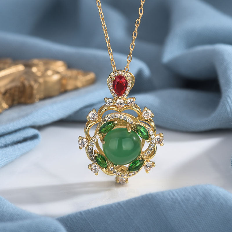 KarmaRipple's Cyan Jade Red Gemstone Fortune Pendant p1