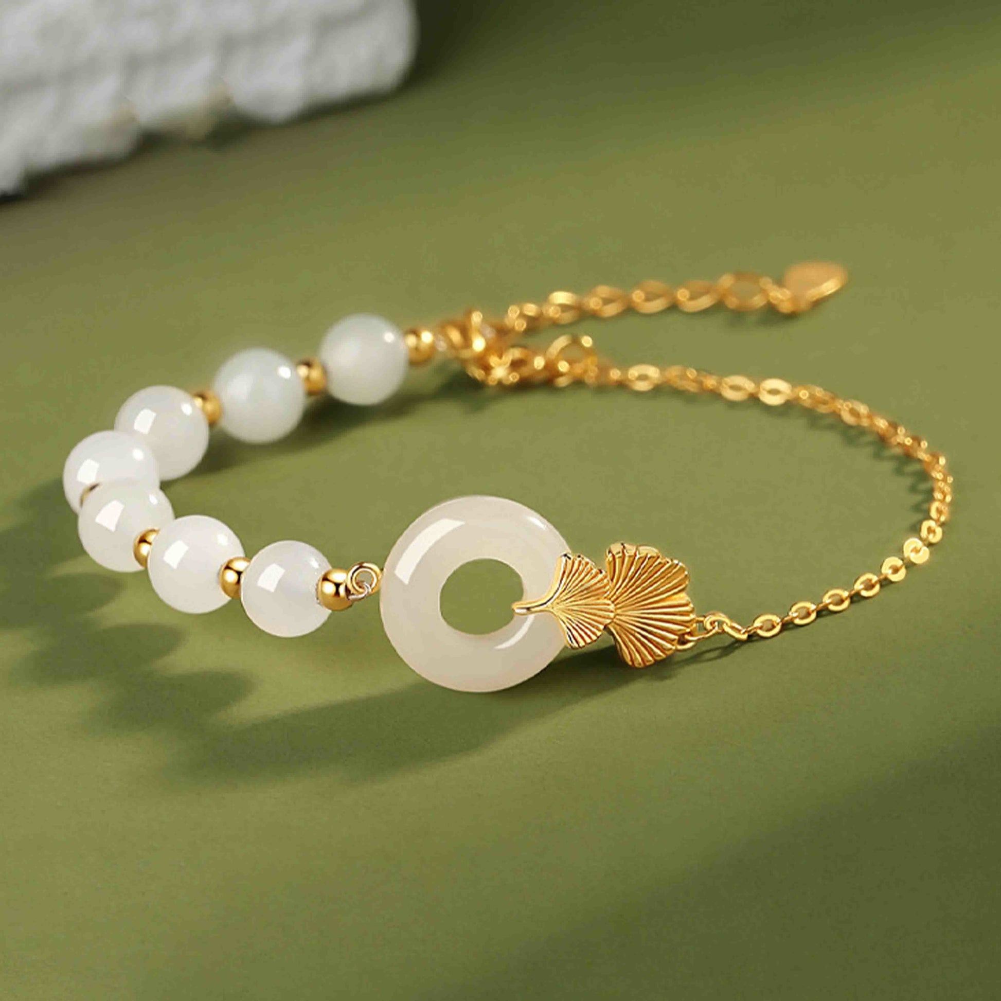 KarmaRipple's 925 Sterling Silver Hetian Ivory Jade Peace Buckle Ginkgo Leaf Fortune Bracelet p1