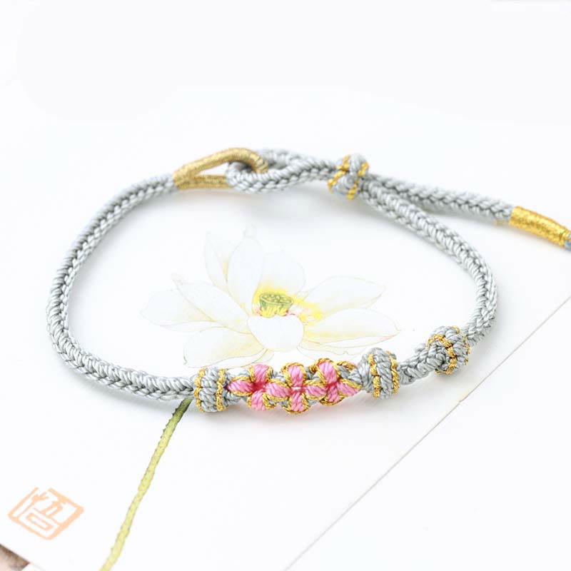 KarmaRipple's Handmade Three Peach Blossoms Fortune Eight Strands Woven String Bracelet p9