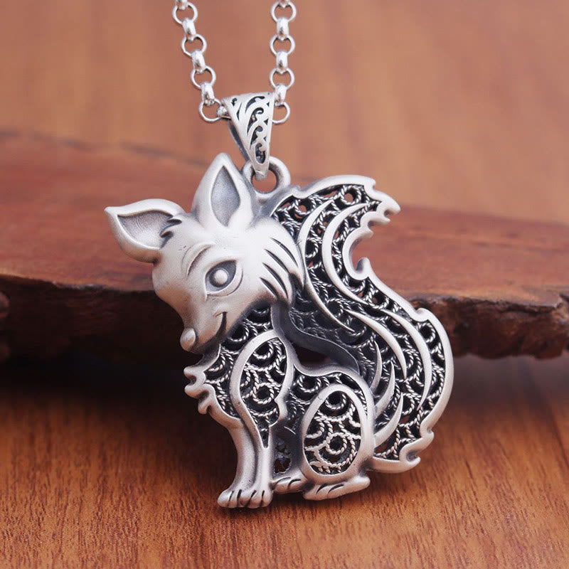 KarmaRipple's Tibet 999 Sterling Silver Fox Pattern Two-sided Blessing Pendant p1