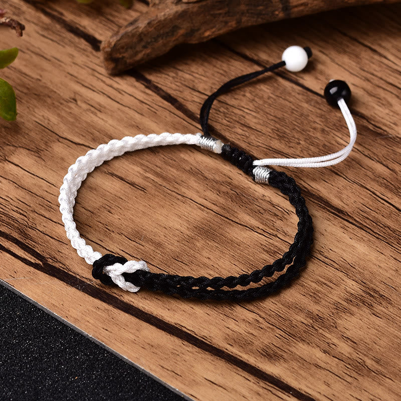 KarmaRipple's Handmade Black Ivory Rope Woven Balancing Bracelet p1