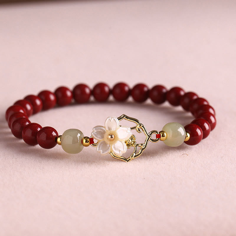 KarmaRipple's Authentic Cinnabar Jade Beaded Tridacna Stone Flower Blessing Bracelet p1
