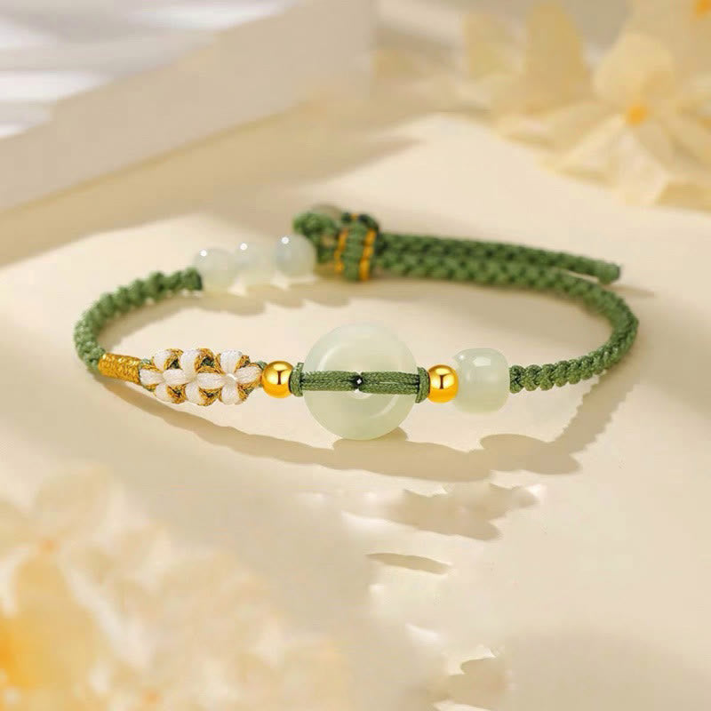 KarmaRipple's Hetian Jade Peace Buckle Fortune Peach Blossom Woven Bracelet p1