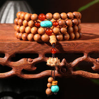 KarmaRipple's Tibetan Sandalwood Lotus Enlightenment Talisman Mala Bracelet