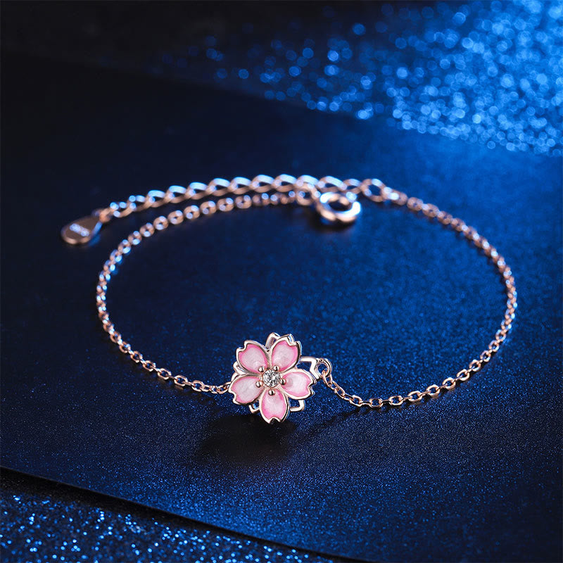 KarmaRipple's 925 Sterling Silver Cherry Blossom Blessing Chain Bracelet Rotatable Ring p1