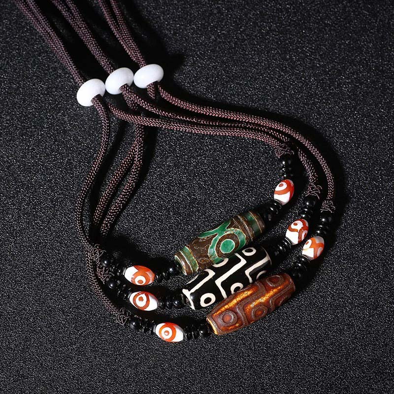 KarmaRipple's Tibetan Nine-Eye Dzi Bead Protection String Pendant p9