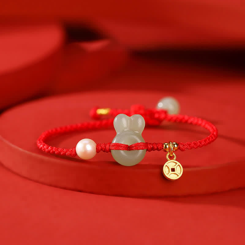 KarmaRipple's 925 Sterling Silver Year of the Rabbit Hetian Jade Bronze Coin Wealth Red String Bracelet p1