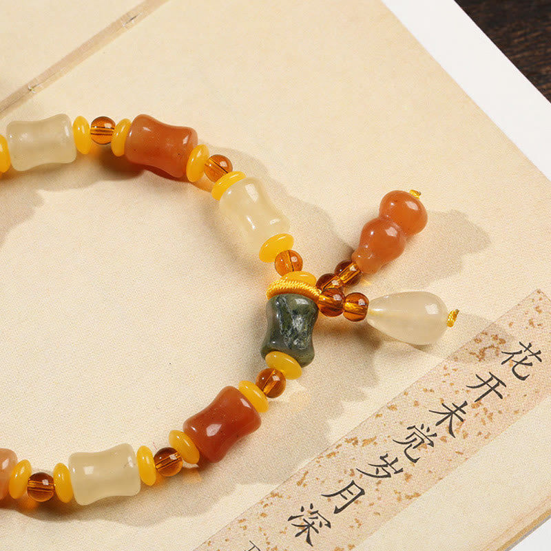 KarmaRipple's Authentic Golden Silk Jade Gourd Wealth Talisman Bracelet p4