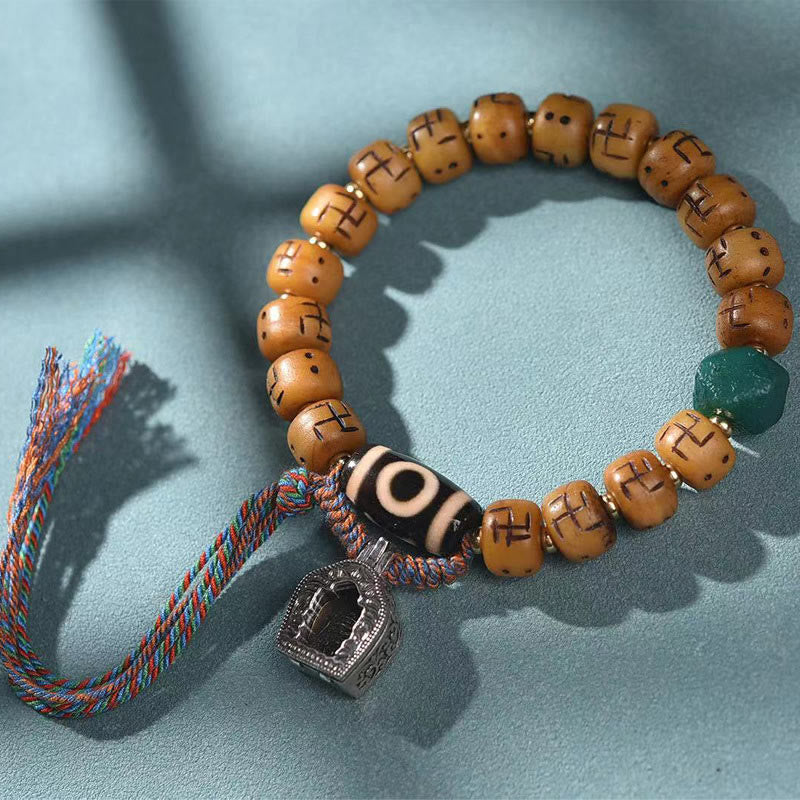 KarmaRipple's Authentic Tibetan Camel Bone Swastika Dzi Bead Shankha Buddha Talisman Kirtimukha Fortune Protection Tassel Bracelet p1