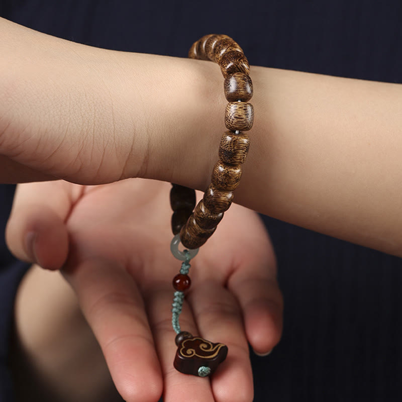 KarmaRipple's Agarwood Bronze Coin Auspicious Cloud Calm Bracelet p12
