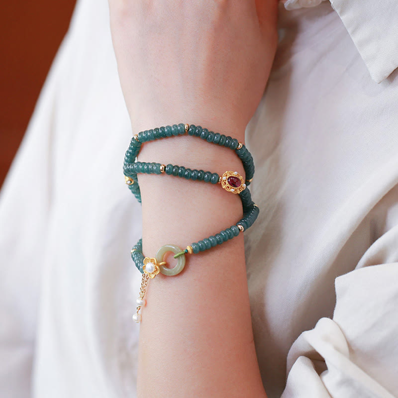 KarmaRipple's 925 Sterling Silver Gold Plated Cyan Jade Flower Peace Buckle Success Triple Wrap Bracelet p1